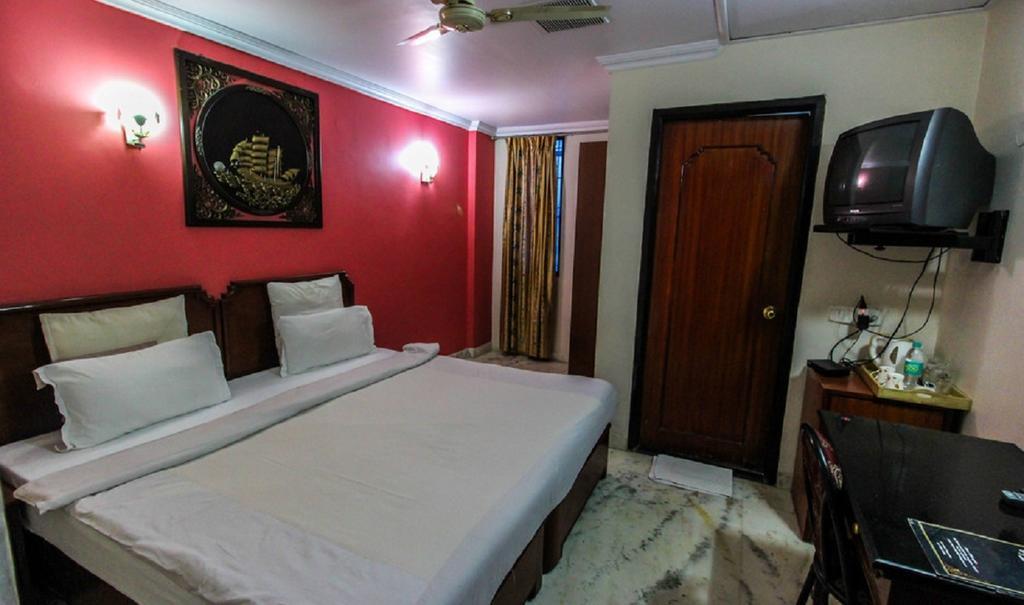 Hotel Pigeon International Bangalore Habitación foto