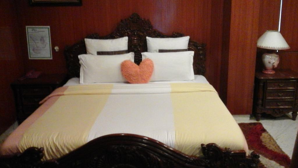 Hotel Pigeon International Bangalore Habitación foto